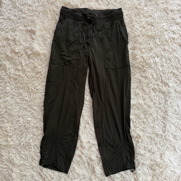 LULULEMON ON The Fly Mid-Rise Pant TravelWomen pockets drawstring khaki SZ 6 - Picture 1 of 7